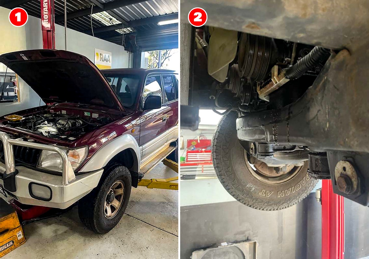 Landcruiser prado with hood open for car service in Blackwood mechanic workshop. Water leaking from water pump.